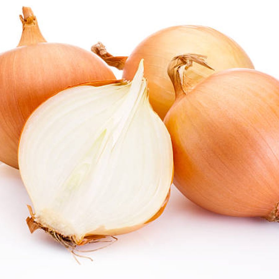 Fresh onion bulbs isolated on white background