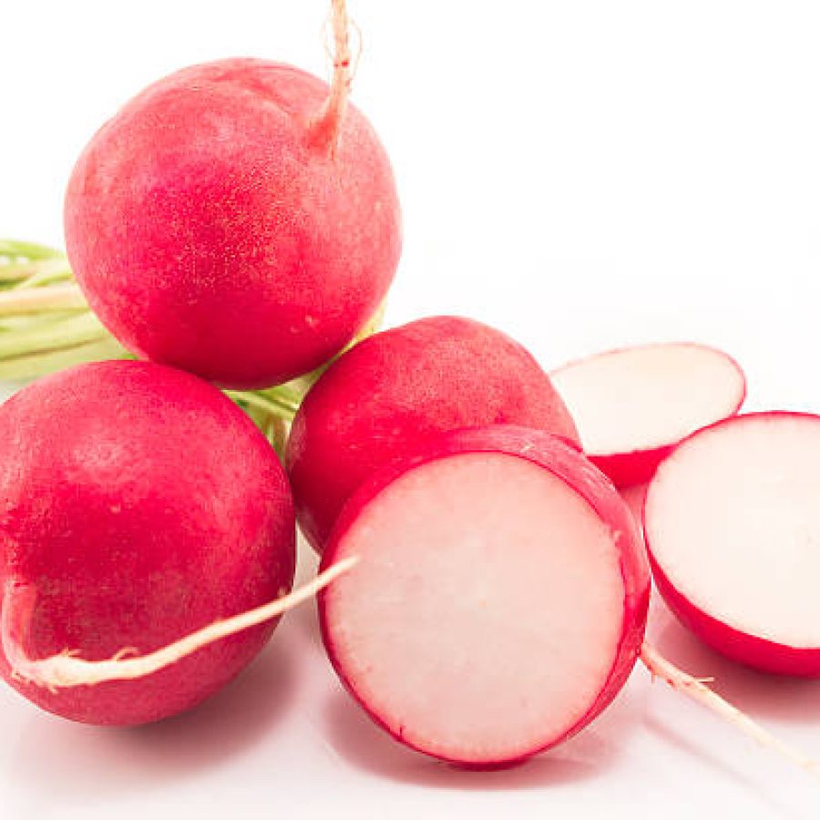 Radishes close-up isolated on white.